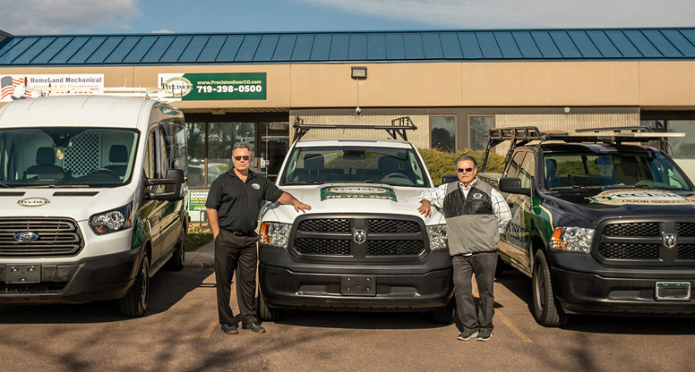 Owners staninding in front of Colorado Springs location